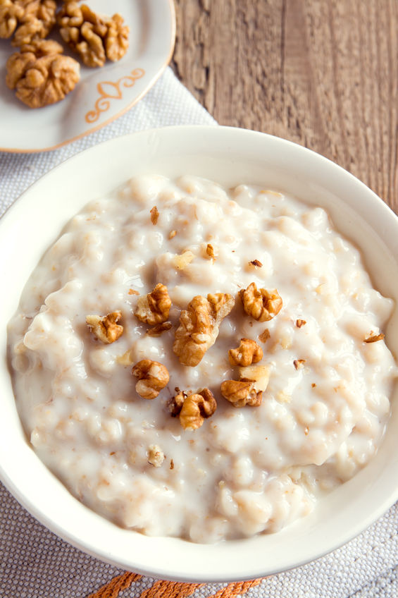 46671469 - oatmeal porridge with walnuts in white bowl for breakfast ...
